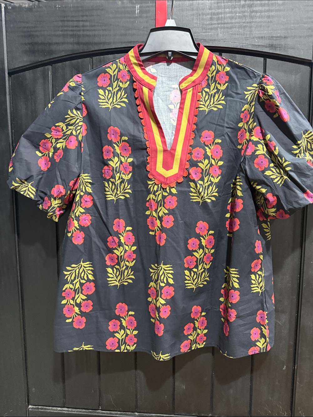 Floral-Print Black Polo Top with Pink & Yellow Accents